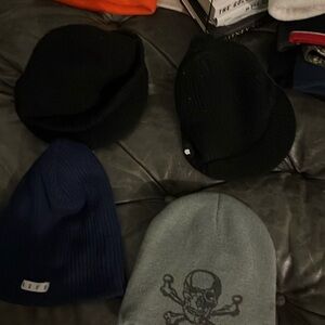 Four men’s winter skater hats